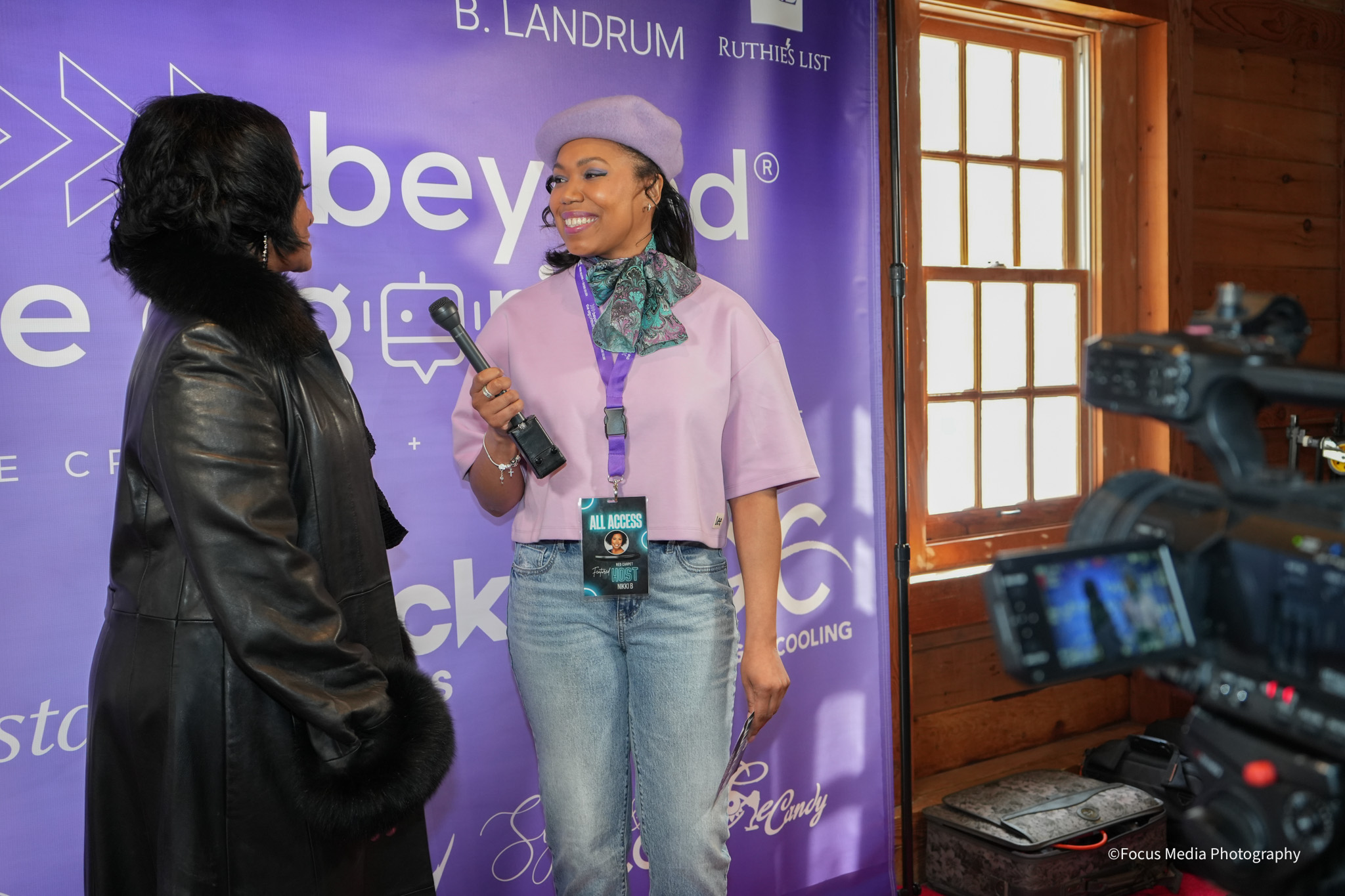 Nikki B interviewing a guest at the Beyond the Algorithm Powerbrand event